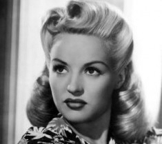 The History of the 1940s Victory Rolls Hairstyle