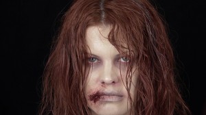 Ashley of Hollywood Noir Makeup wearing an infected zombie make up for halloween